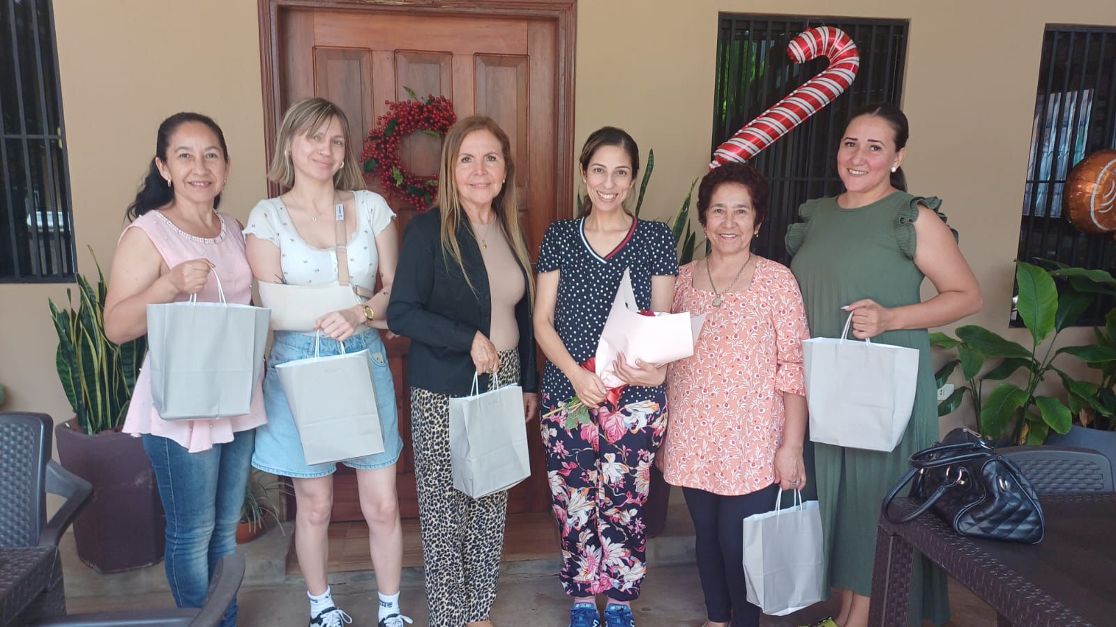 Gloria (third from right) with her team in Paraguay, 2025